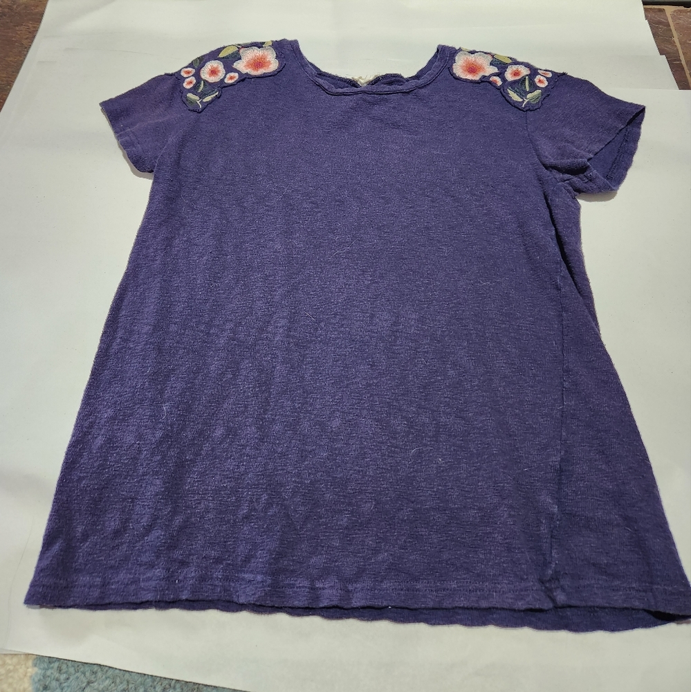 Navy knit top with flower embroidery